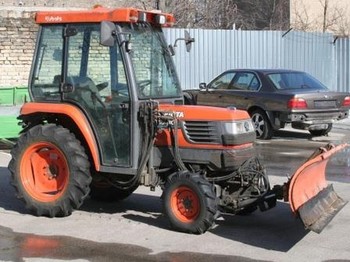 Kubota ST30 with brush and blade - Tractor agricol